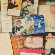 A bunch of pictures on the wall with baby photos